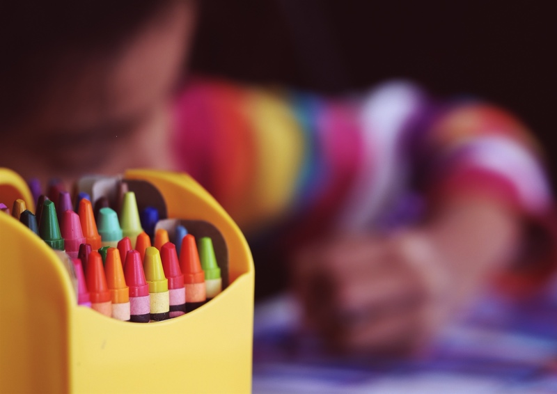 Romp n' Roll kids gym suggests keeping supplies organized in color-coded binders and bins to help children stay concentrated.