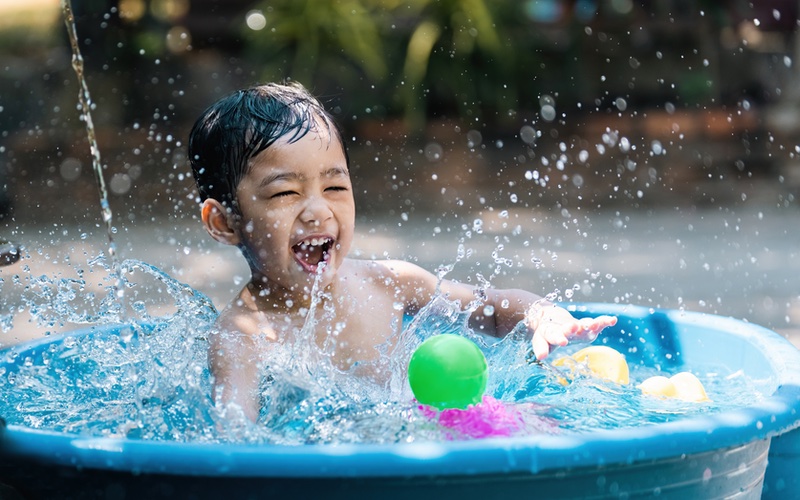 Fun water activity ideas to do with your kids this summer and keep them cool in Katy, TX - tips from Romp n' Roll