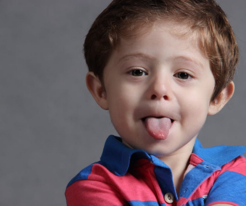 kid sticking tongue out