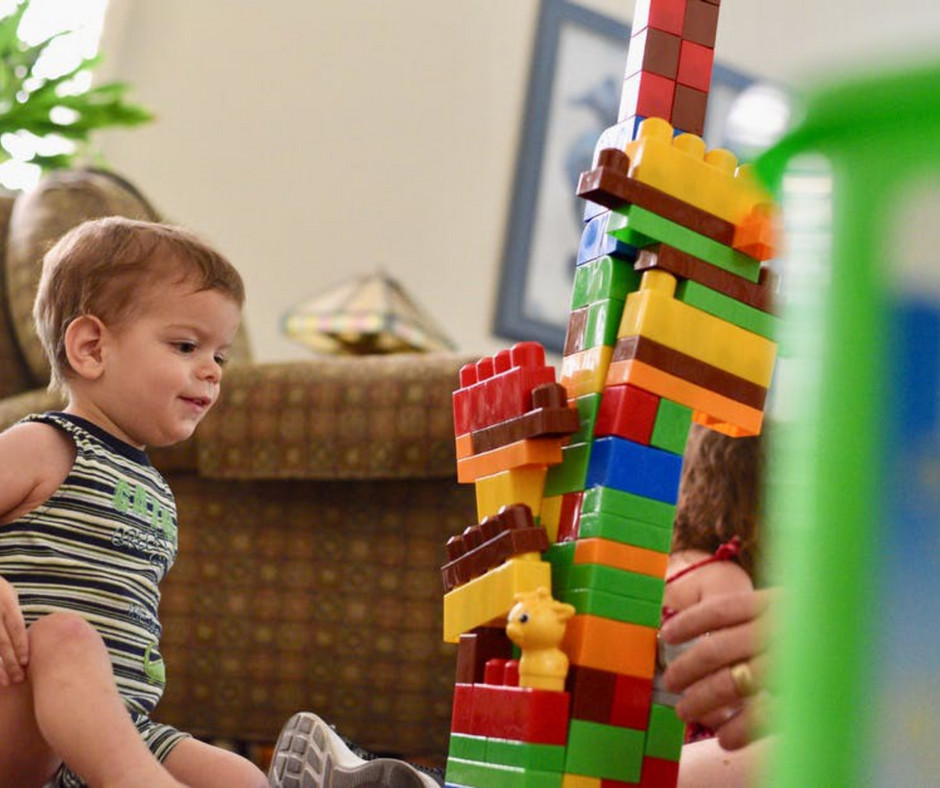 kid with building blocks