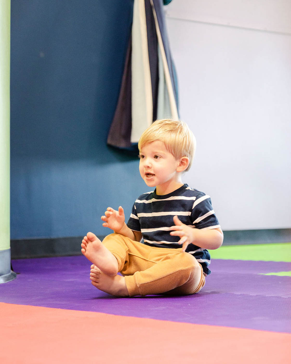 A boy at Romp n' Roll enjoying the sensory gym in Glen Allen, VA.