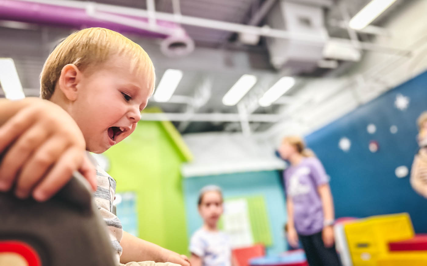 Toddlers playing at Romp n' Roll Katy's classes for 1 year olds in Katy, TX