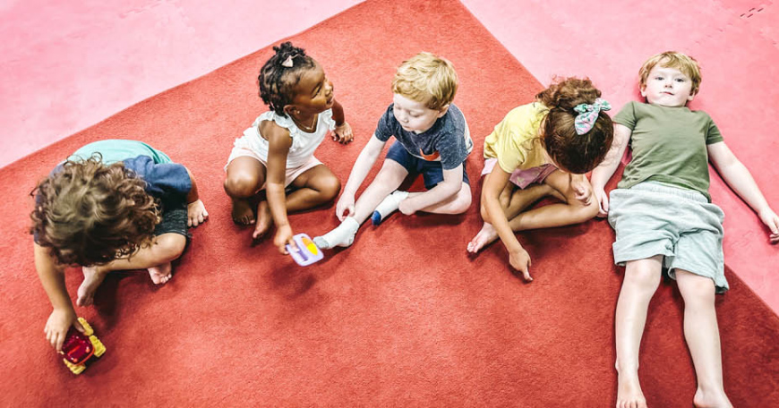 Participants of Romp n' Roll toddler activities in Glen Allen enjoying some engaging and stimulating events.