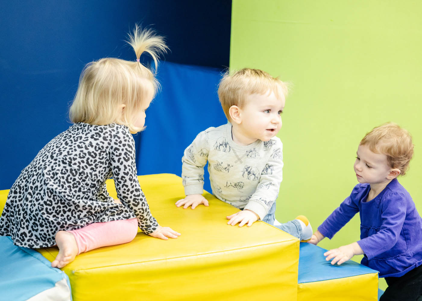 
				3 kids playing at Romp n' Roll - a kids' gym in Bon Air, VA.
			