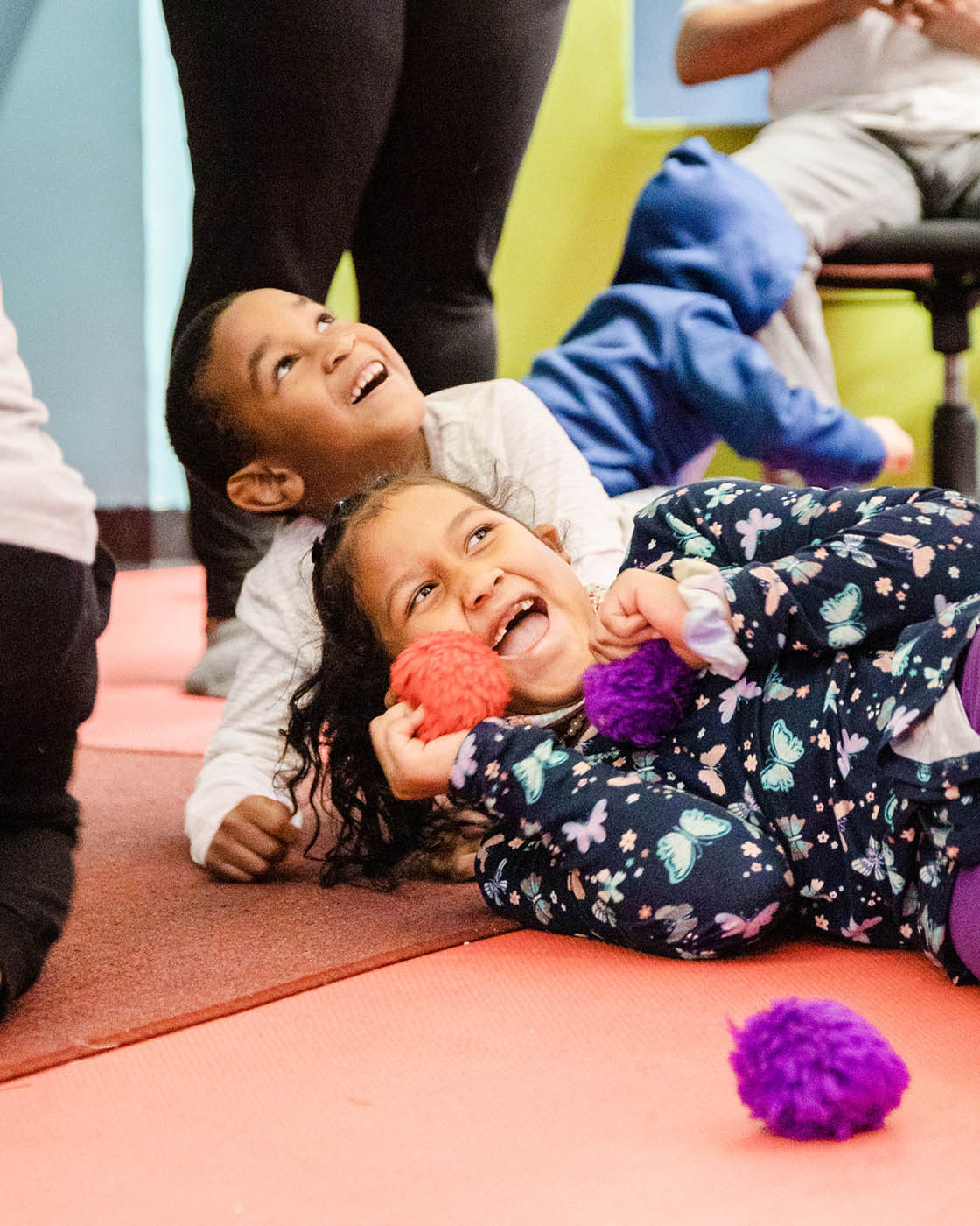 Two girls having a blast at Romp n' Roll - book an adventure class in St. Petersburg, FL today.