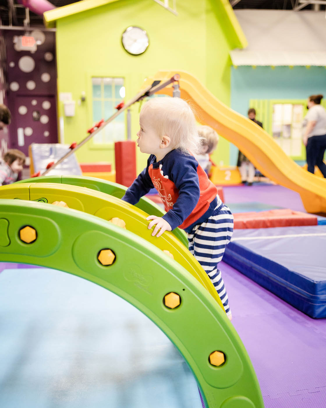 A little bloy playing on Romp n' Roll's indoor playground in Glen Allen, VA.