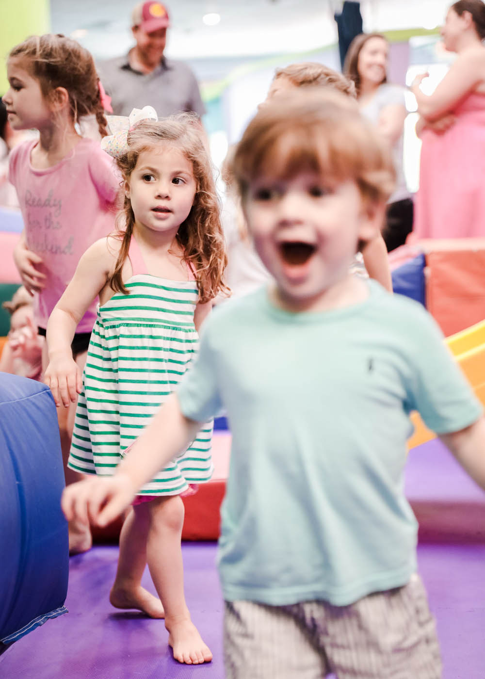 A group of different aged kids at Romp n' Roll at preschool classes in Glen Allen, VA.