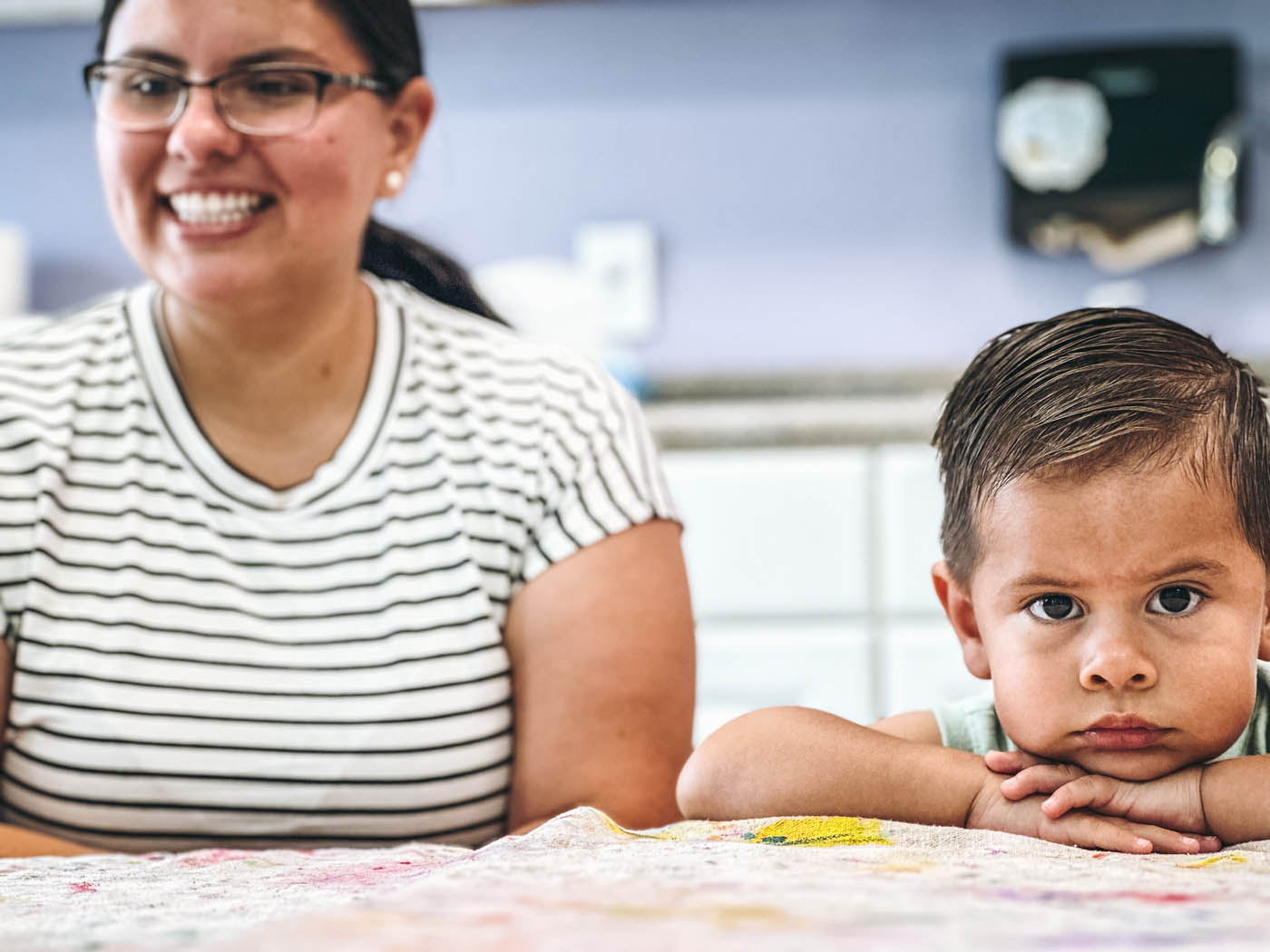 Kids and adults playing at Romp n' Roll in Katy cooking classes for kids.