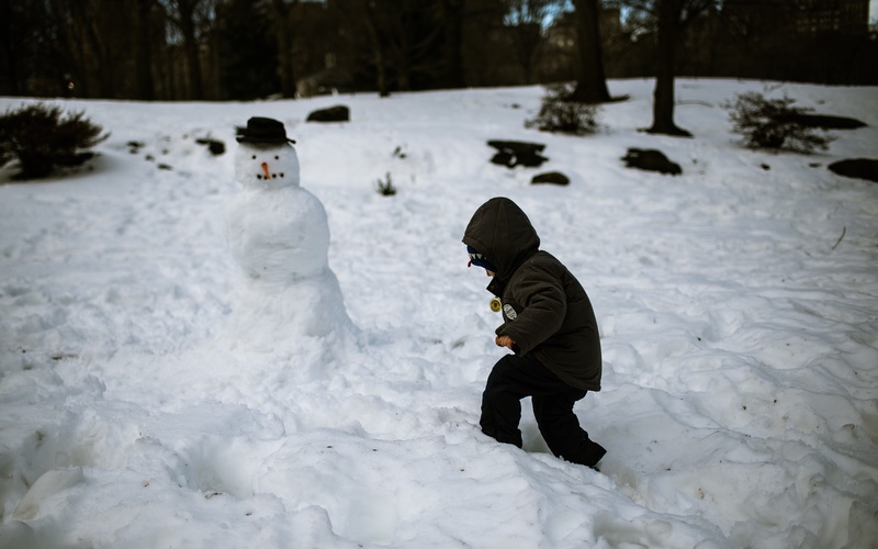 Romp n' Roll kids gym suggests planning more hands-on experiences with your toddler this holiday season, such as building a snowman or baking cookies together.