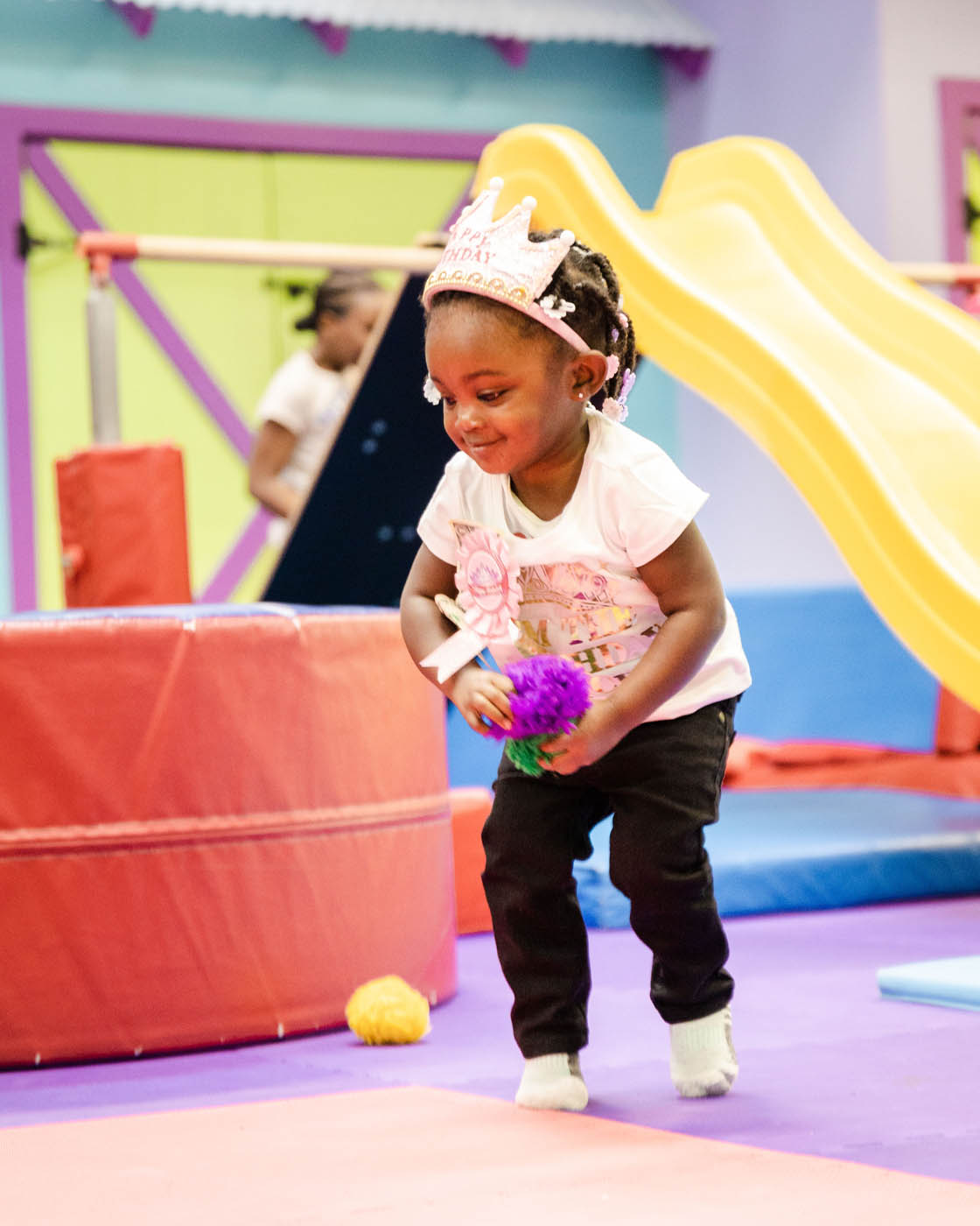 A little girl enjoying her b day party at Romp n' Roll West End kids birthday party places.