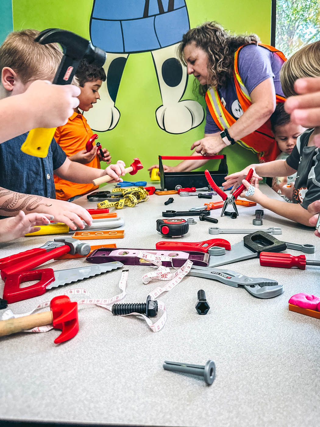 A Romp n' Roll Katy teacher participating in builder summer camp for in Katy, TX.