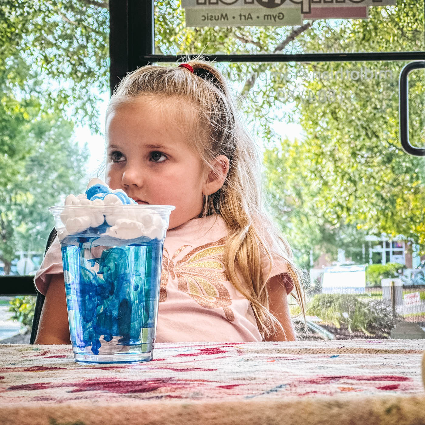 A girl in Romp n' Roll's science classes for kids in Glen Allen, VA.