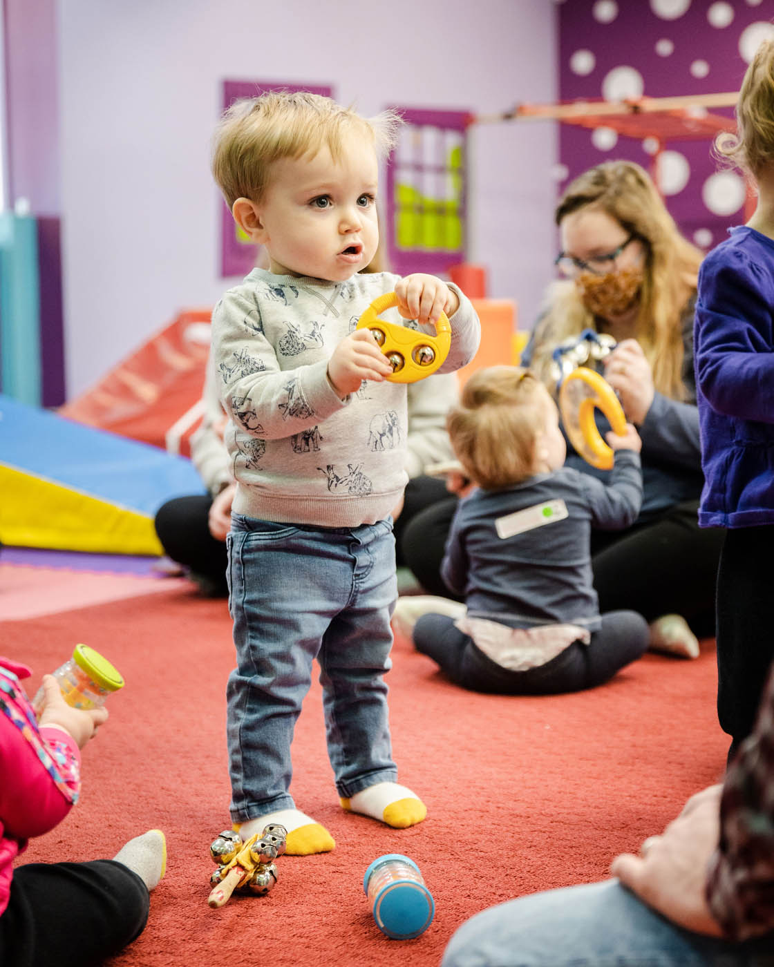 A young boy enjoying music and dance classes with Romp n' Roll in Glen Allen.