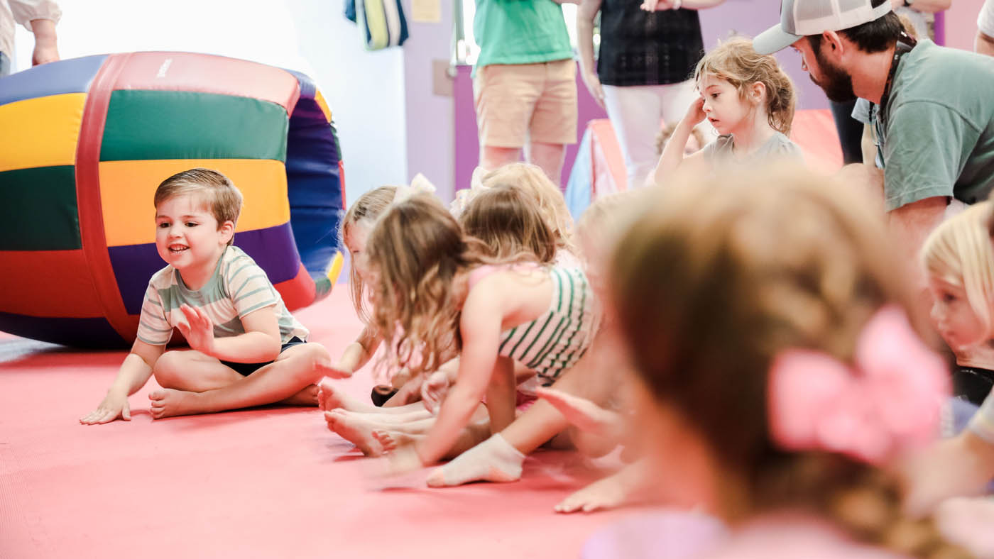 A group of kids exploring their senses together at autism safe sensory gym classes in Midlothian, VA.